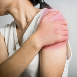 woman get shoulder pain and injured muscle